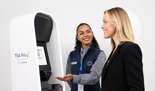 CLEAR Ambassador helping person sign up for TSA PreCheck